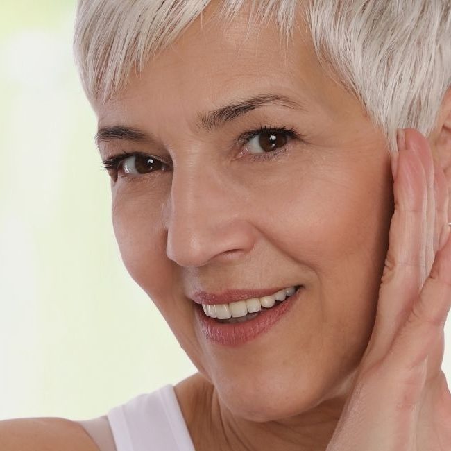 Grey haired lady smiling